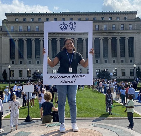 Aleena G., DDC'22, CC'26 in front of Butler Library